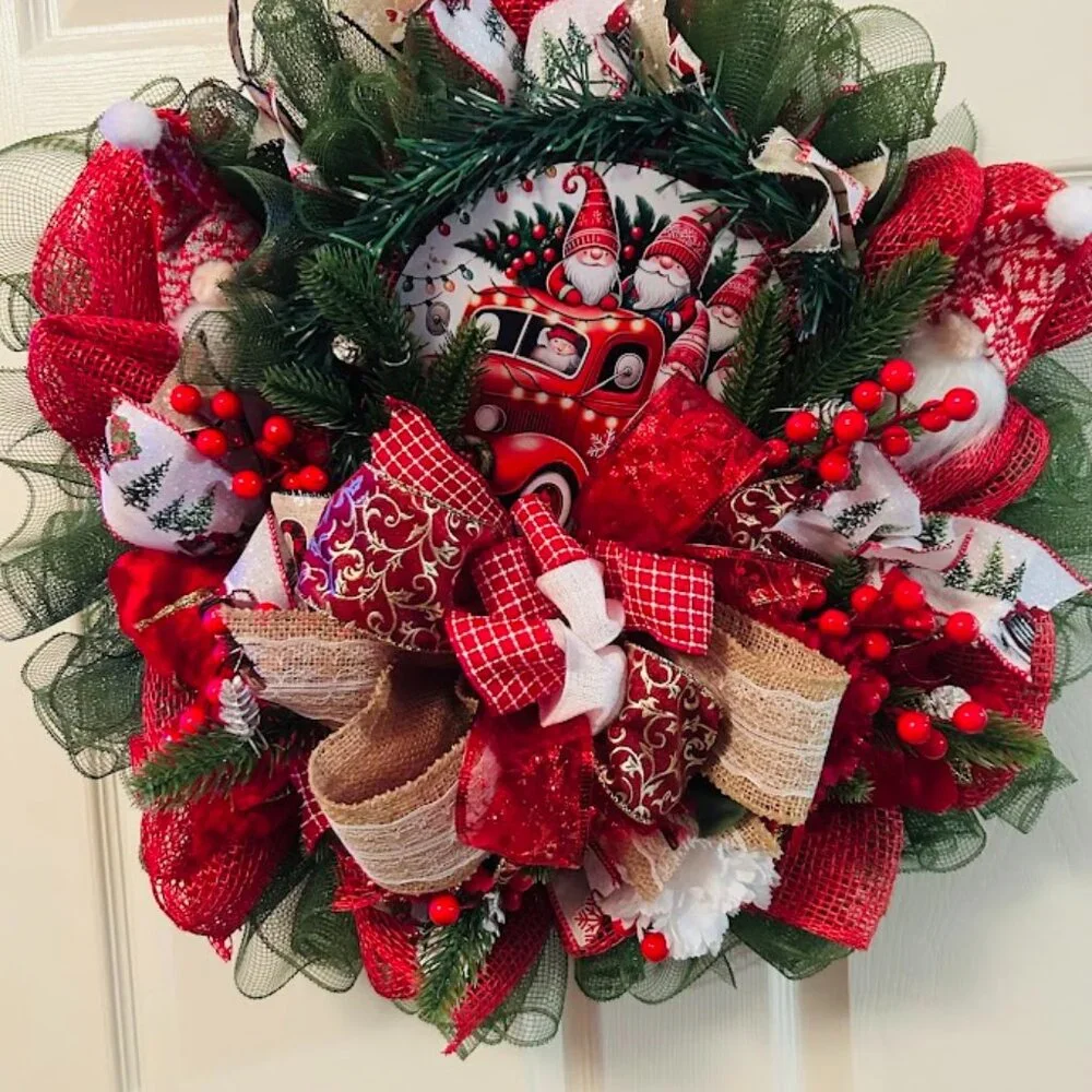christmas wreath/ dnome in a truck hauling christmas dnomes
